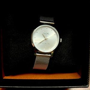 Coach silver watch, never worn with adjustable band